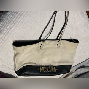 Moschino leather made in Italy tote. Zip top.